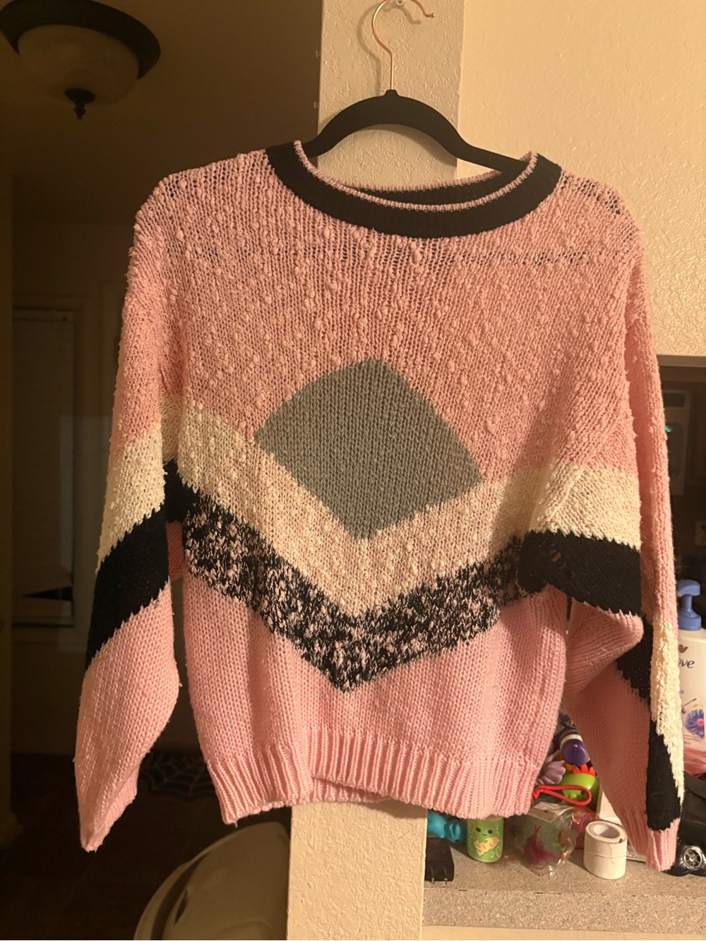 Vintage Pink Geometric Crewneck Sweater with Black and Gray Accents